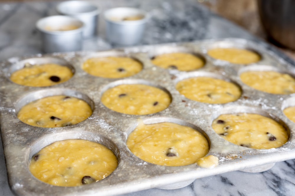 Banana bread mix in cupcake tins